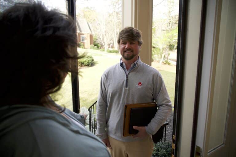 handyman and customer at a home