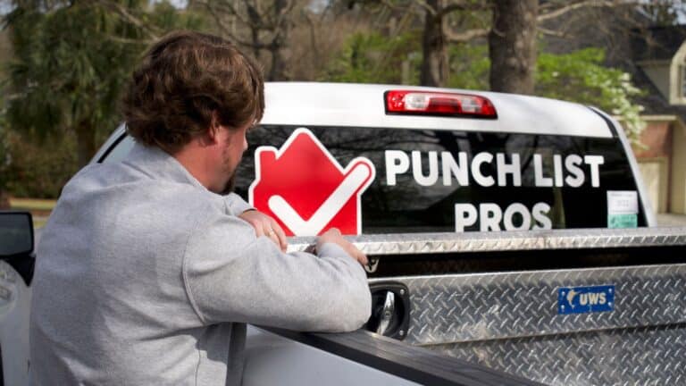 handyman looking into truck toolbox