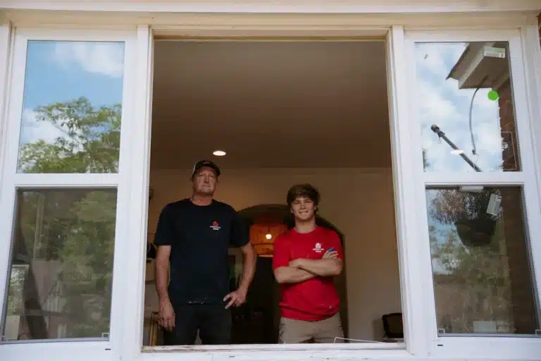 handymen during a window install
