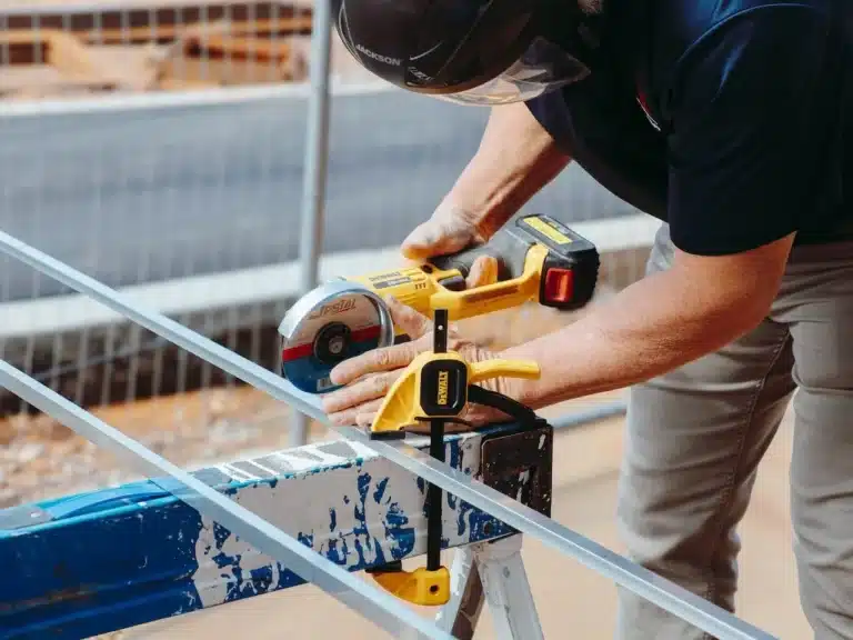 Deck & Patio Repair 1 Technician repairing a wooden deck and patio, replacing damaged boards and restoring safe use.