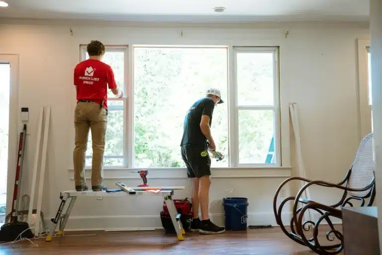 Kitchen Lighting 1 Electrician installing modern kitchen lighting fixtures, enhancing both style and functionality for food preparation and dining.