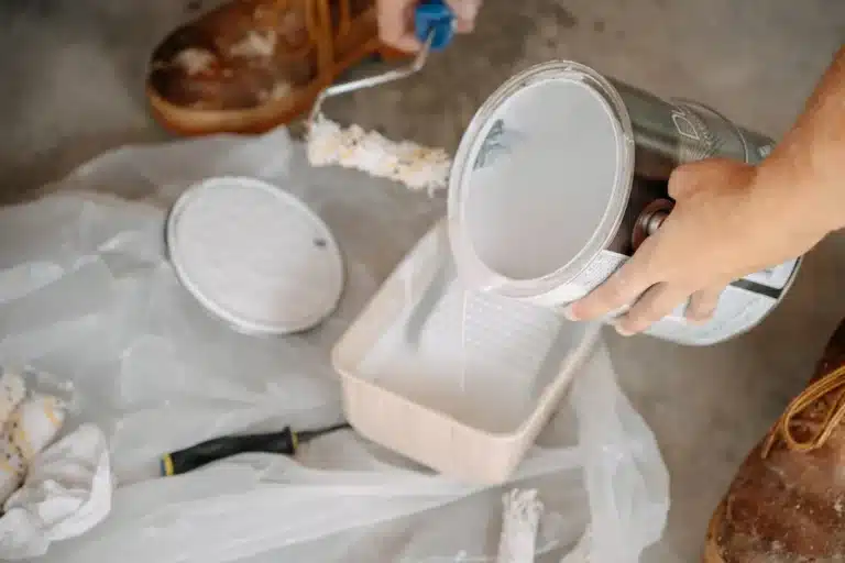 Touch Ups & Spot Painting 1 Punch List Pros technician performing touch-ups and spot painting on interior walls, blending repairs seamlessly with existing paintwork.